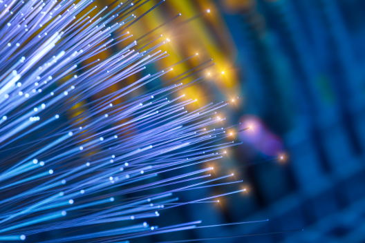 Fiber optic cable illuminated with blue lights